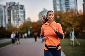 A person jogging in the morning for health and wellness.